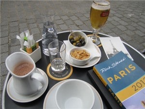Paris - Rick Steves guidebook at Cafe Central